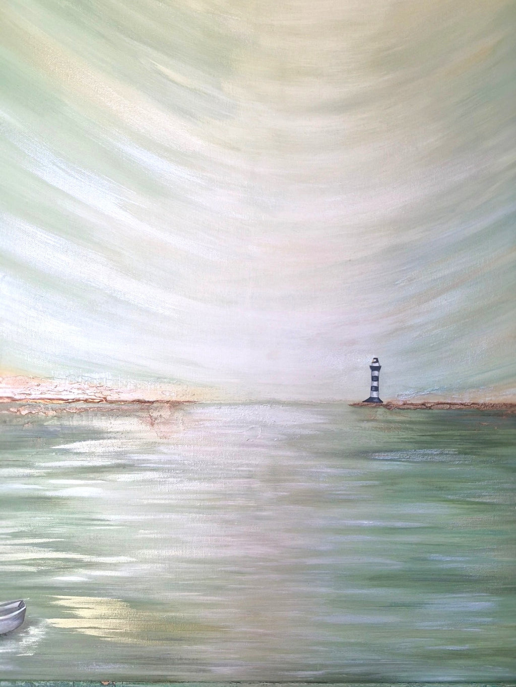Lighthouse on a beach with a blurred water effect
