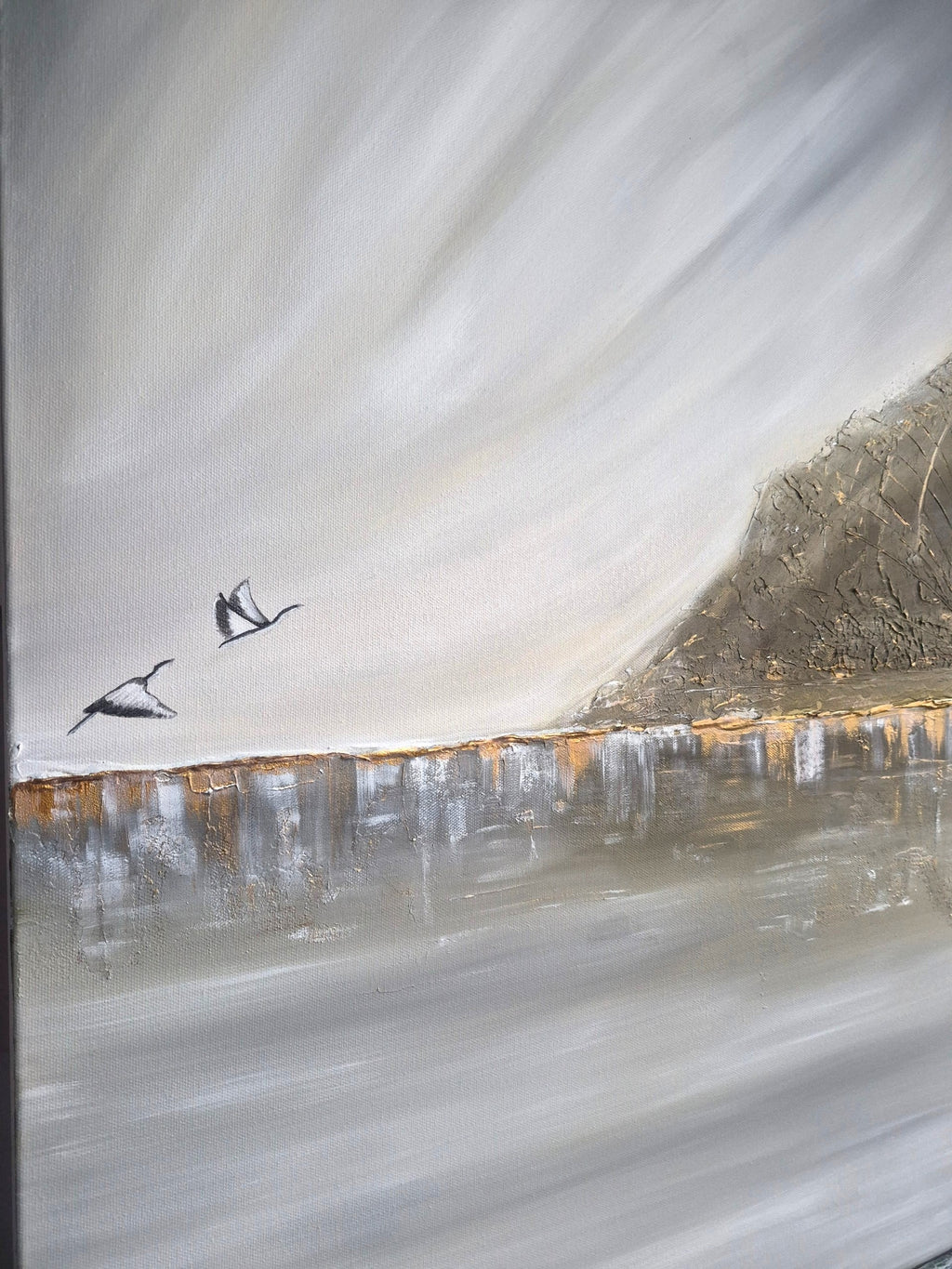 An abstract landscape painting featuring two flying birds against a textured, swirling sky and water, with a dark rocky cliff on the right.